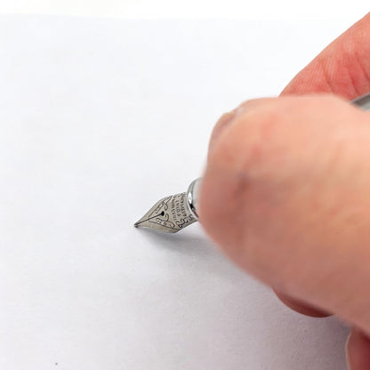Iron Meteorite Pen、4.5 billion years、Around 14cm、Diameter approximately 1 cm